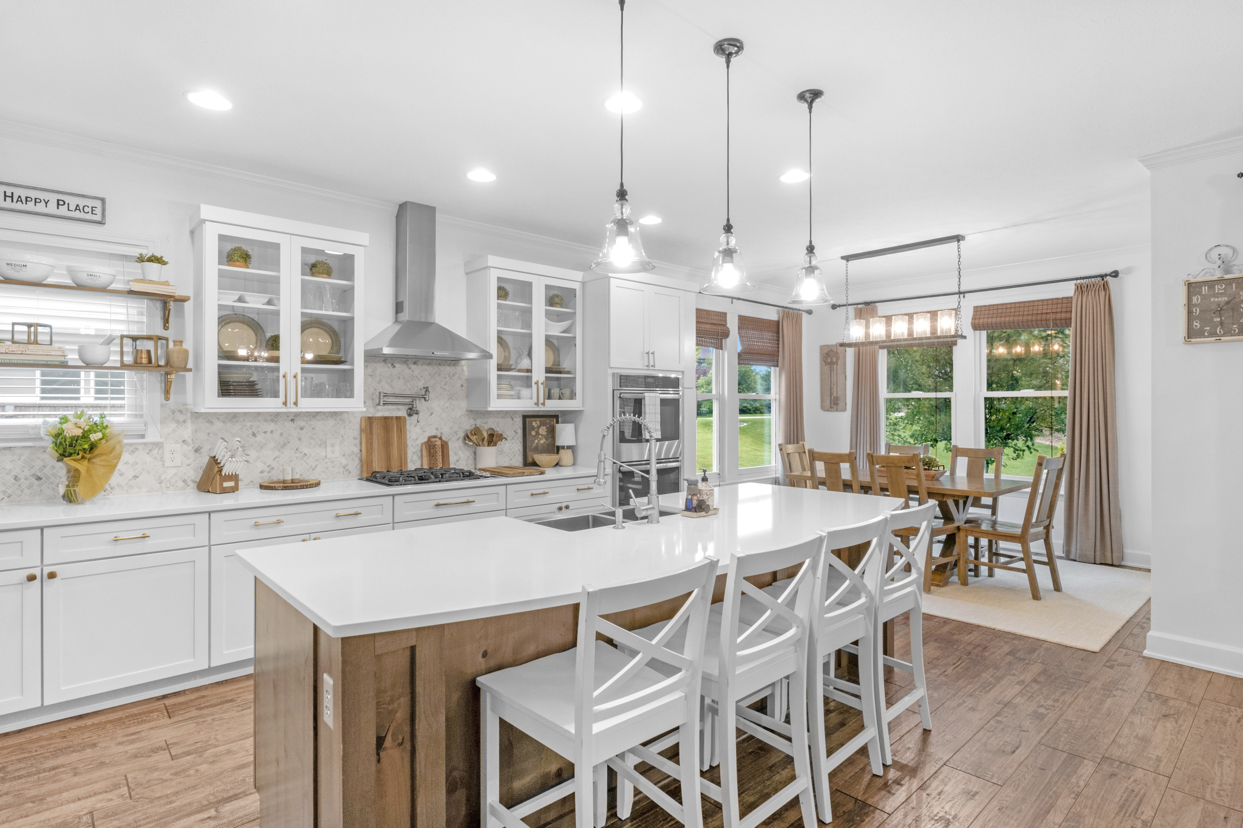 Bright kitchen and dining area by Indy Flycam