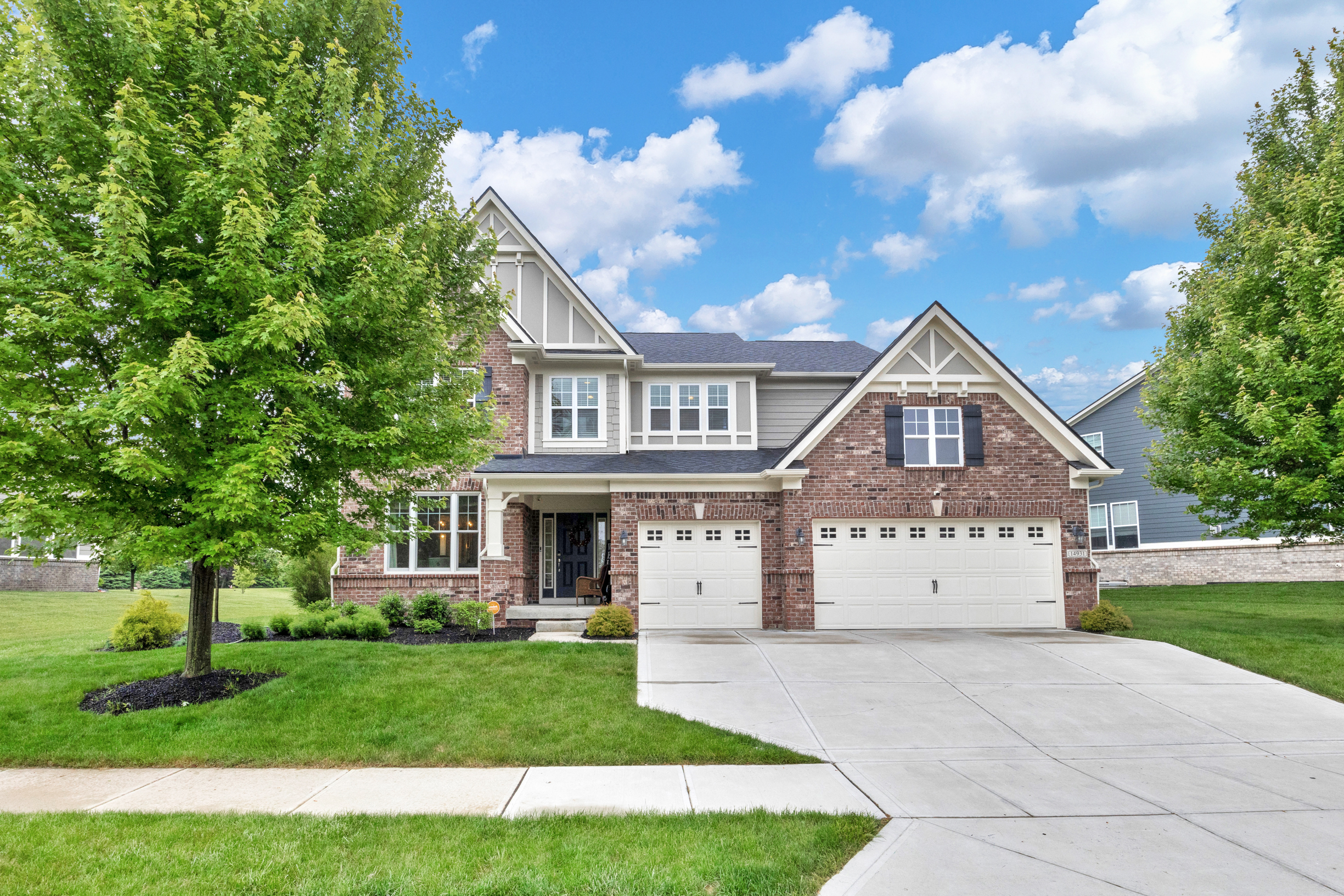 Daytime brick house exterior — Indianapolis listing photography